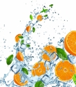Fresh oranges in water splash